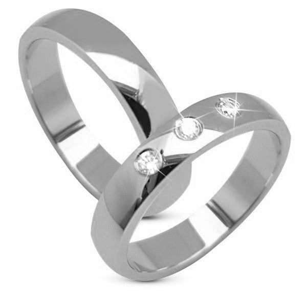 Aagaard vielsesringe i 9 eller 14 karat hvidguld med 0,09 ct lab-grown diamanter – klassiske runde ringe med tre sten.